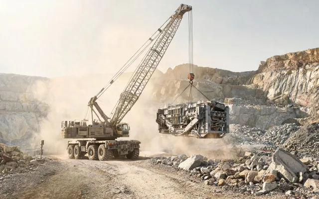 Rough-terrain crane on quarry access road