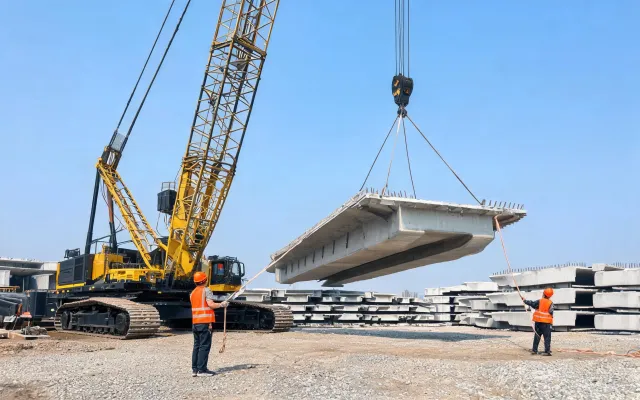 Crawler crane on bridge precast yard